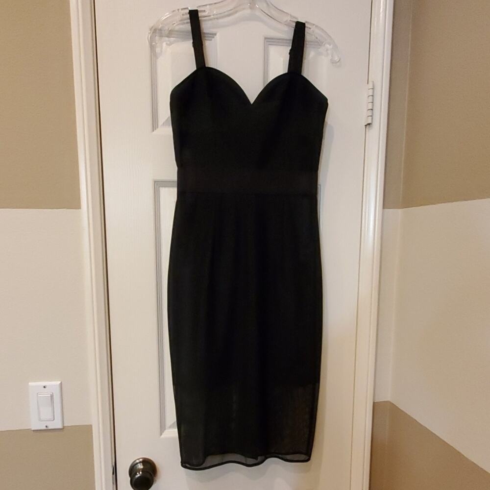Milly black silk spaghetti strap dress. Size 2. Mesh see through on the bottom